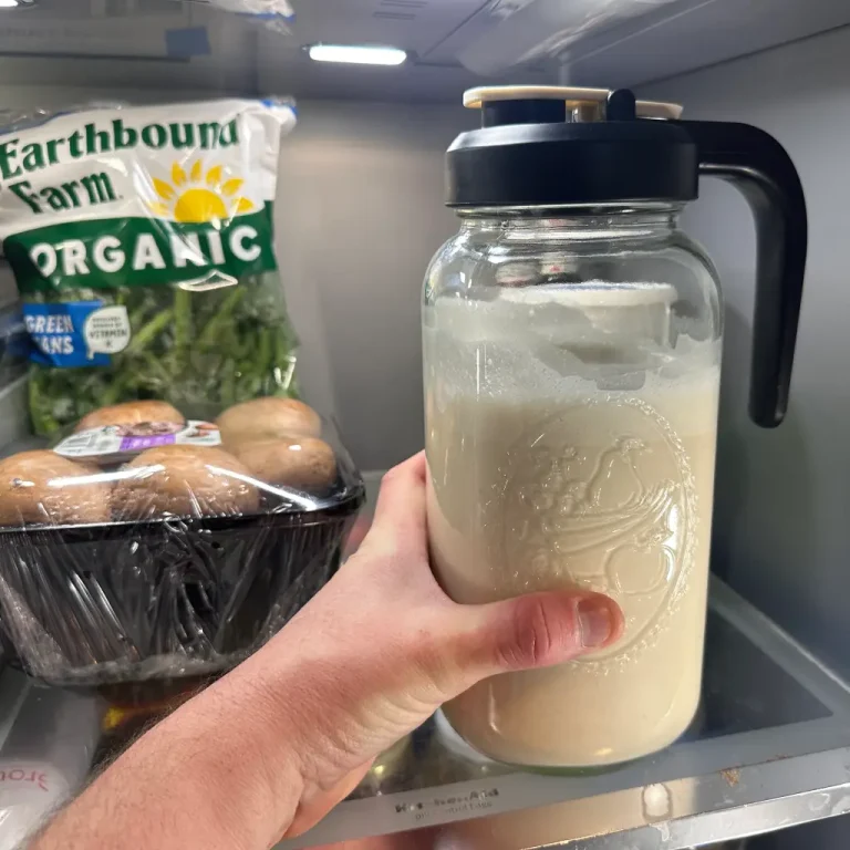 placing air tight container of fresh nut milk in refrigerator for 3-5 days